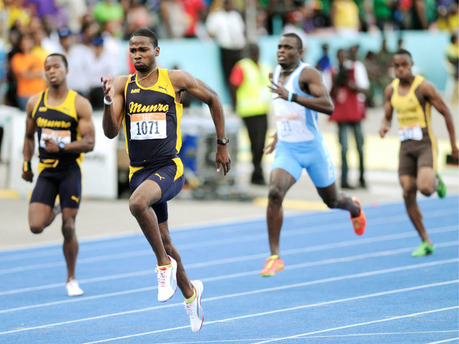Delano Williams of Munro College winning heat 1 of the Class One Boys 200m.-Ian Allen/Photographer